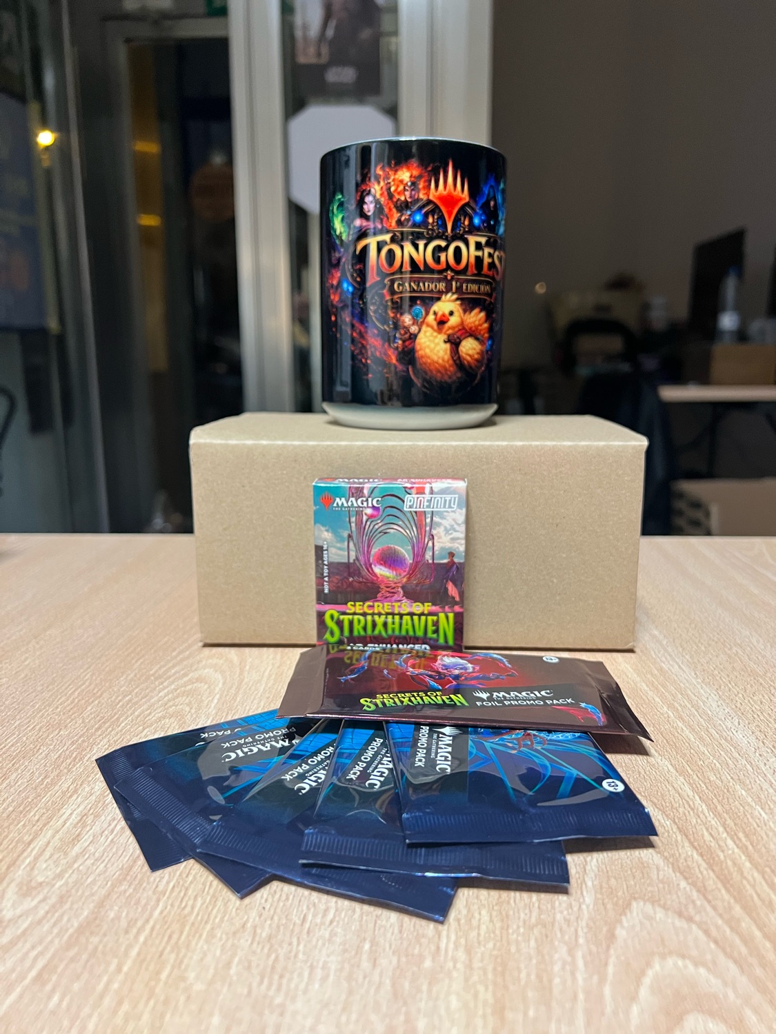 Taza de ganador del Tongofest, Secret Lair Secrets of Strixhaven y promo packs